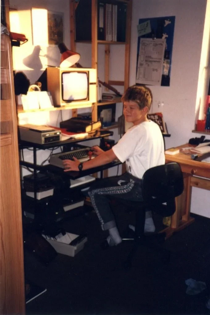 Tim as a kid at his C64